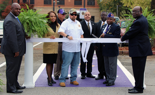 AAMU officials cut the ribbon to one of various types of parking spaces for veterans.