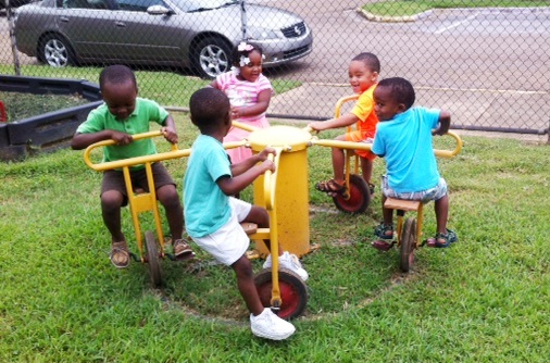 CDC children play in a playground