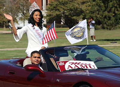 Miss AAMU waves to the crowd from a car in the Homecoming On-Campus Parade