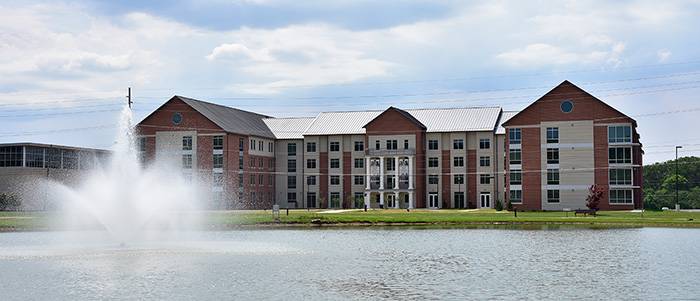 legacy lake in front of new student residence hall