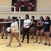 An intramural volleyball game in the Wellness Center's gym