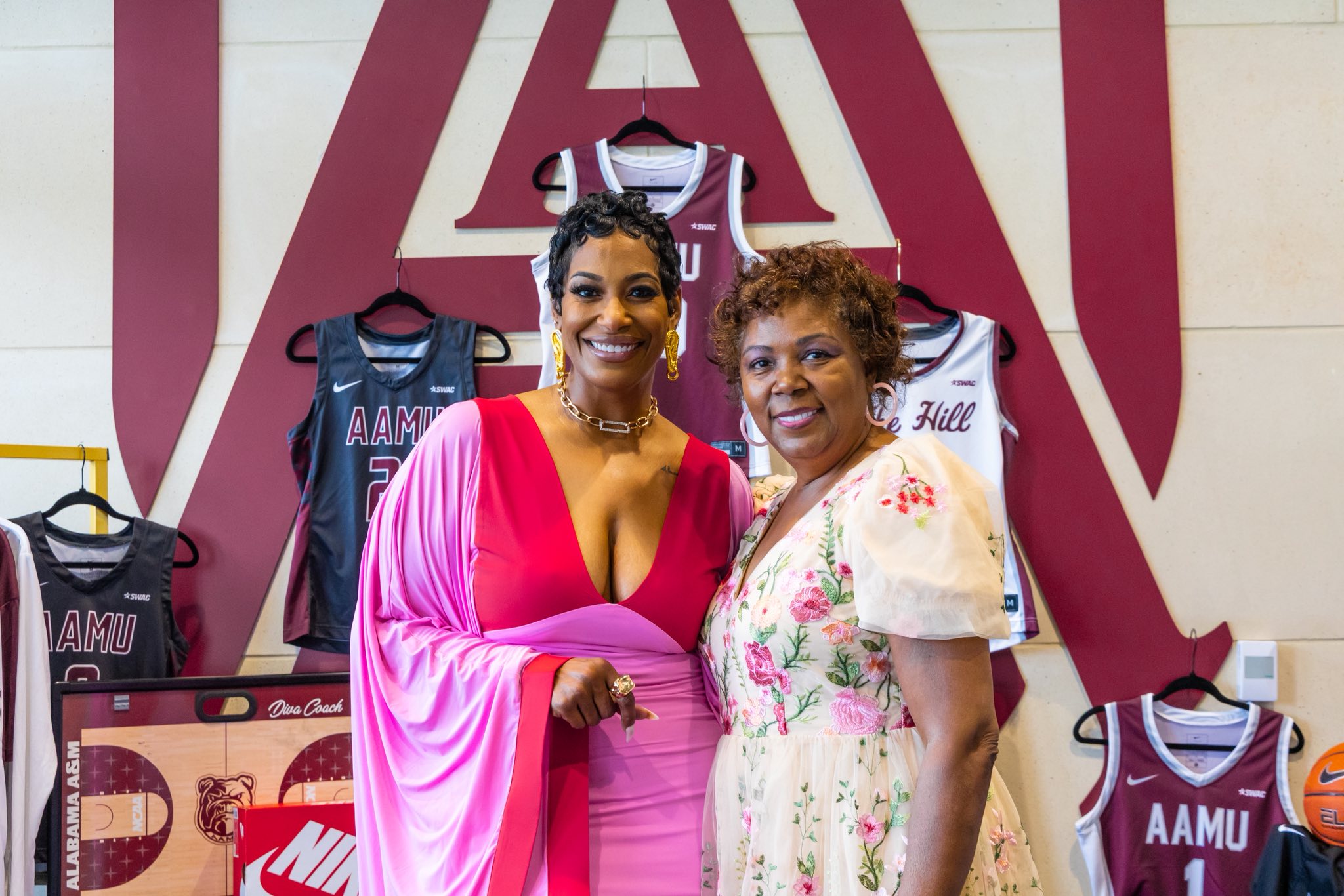 AAMU Head Women's Basketball Coach Dawn Thornton smiles with Dr. Dorothy Huston, retired AAMU Vice President for Research and Development