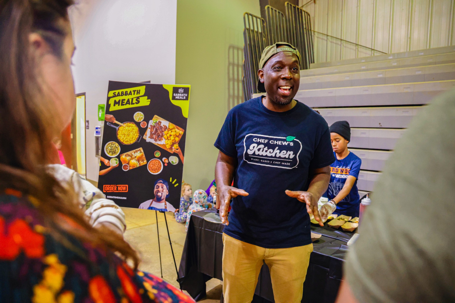 Ag Expo Gold Sponsor and exhibitor Chef Chew of Something Better Foods, Inc. chats with Expo attendees