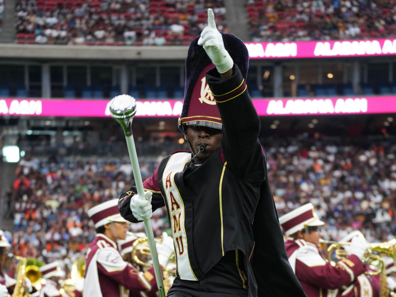 Drum Major Leaps in Air during performance at Pepsi National Battle of the Bands at NRG Stadium in Houston