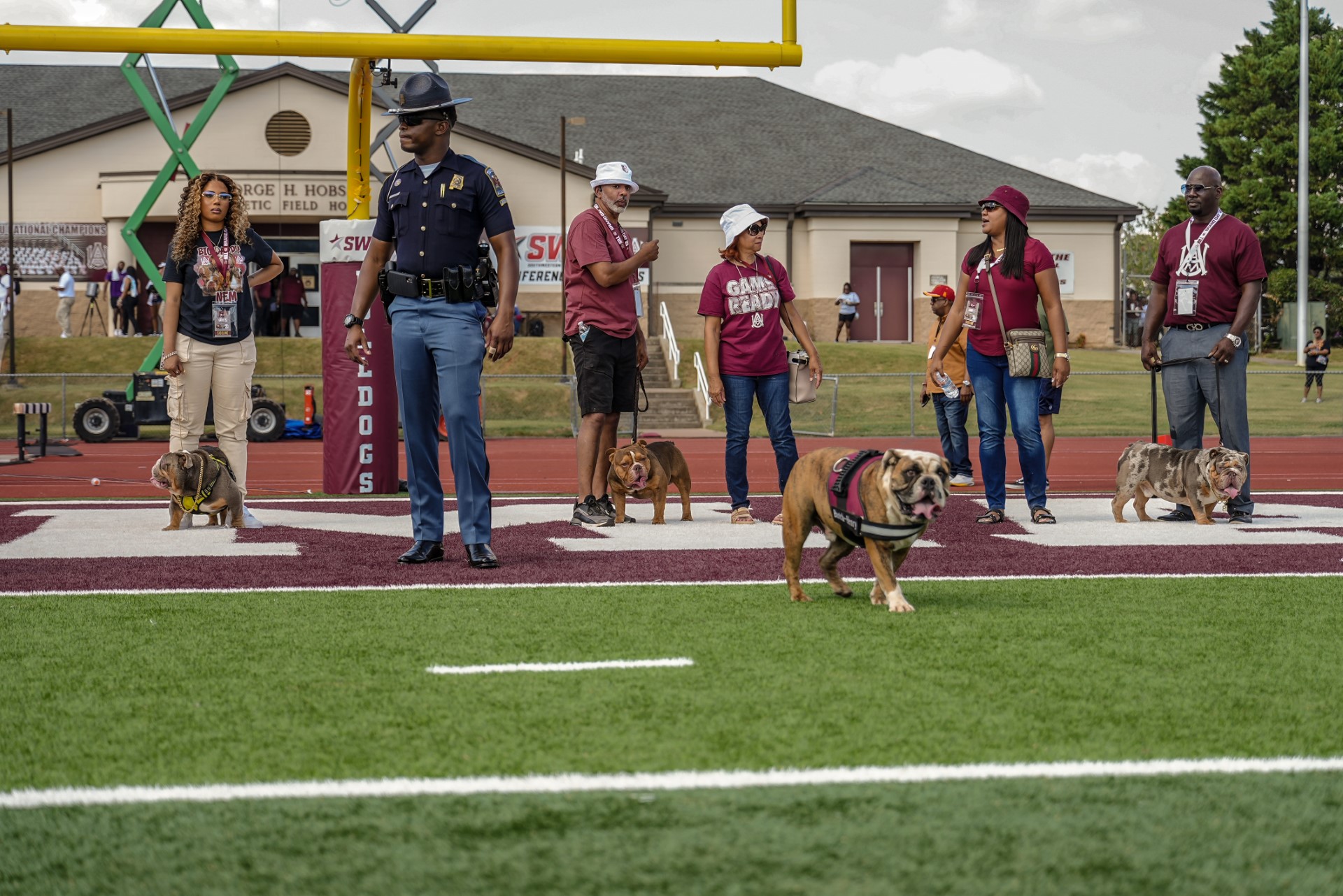 Big Daddy, Keedog and Barkley tha Bulldog with Butch Henry (front)