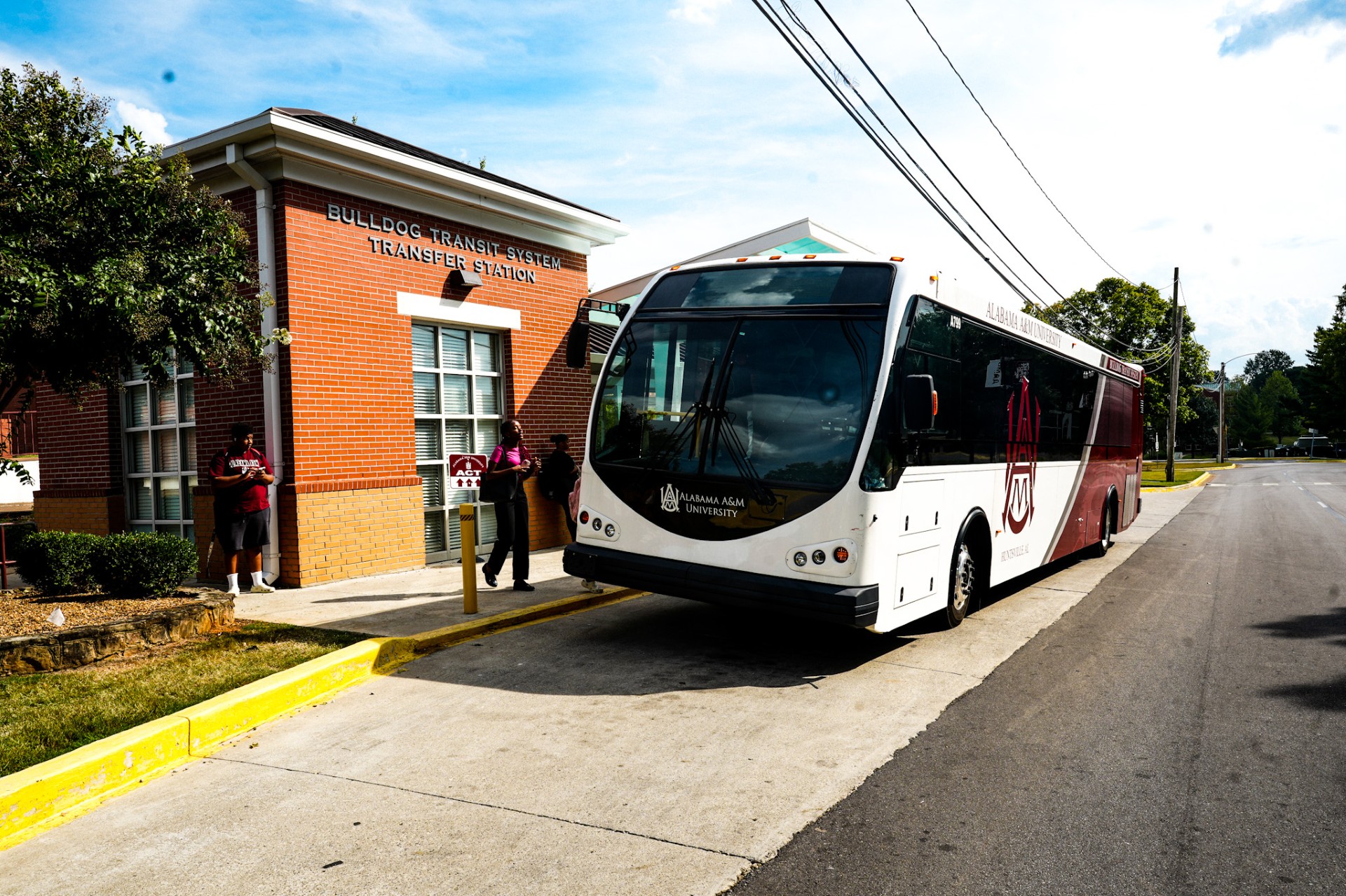 Alabama A&M University students boarding BTS electric bus