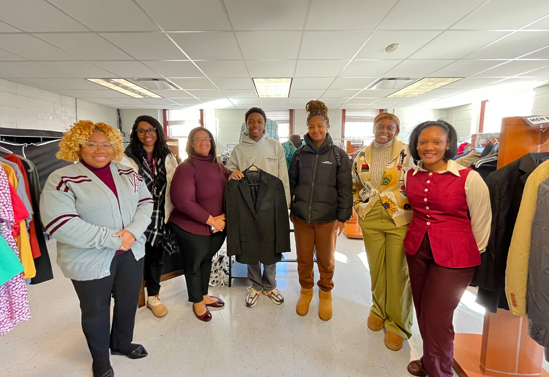 AAMU students, faculty and staff take a group photo at the Diann H. Greer Career Closet at AAMU