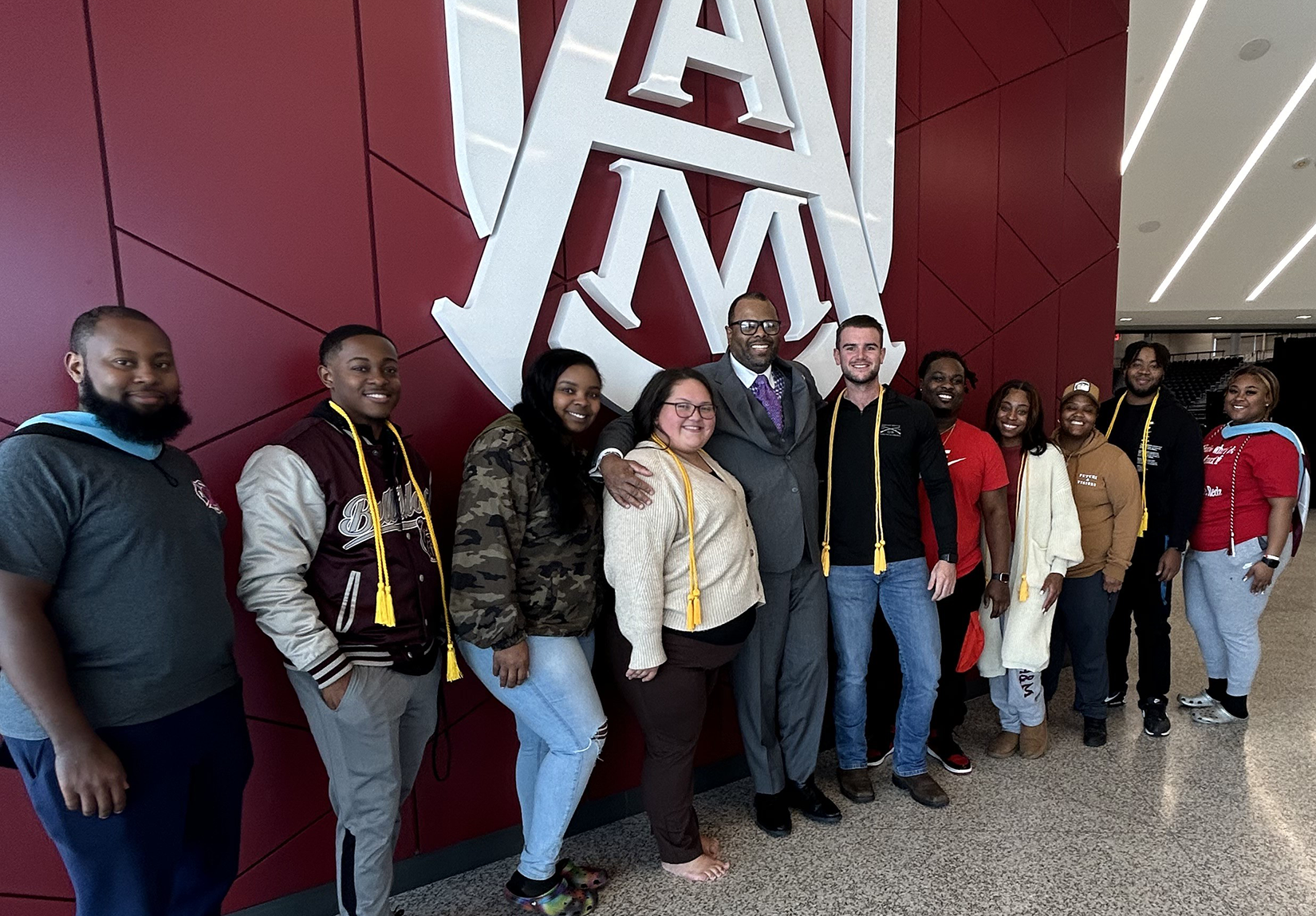 Photo (L-R) Jawonki Moseley, master's, mathematics; Bryce Massey, physical education; Maleah Stallworth, elementary education; Maria Moreno, family and consumer sciences; Dr. Peter Eley, Interim Dean; Rodney Farrell, physical education; Shawn Seward. physical education; Taugene Morris, elementary education; Daija Smoot. physical education; Evan Spears, physical education; Hope Scruggs, master's, mathematics education