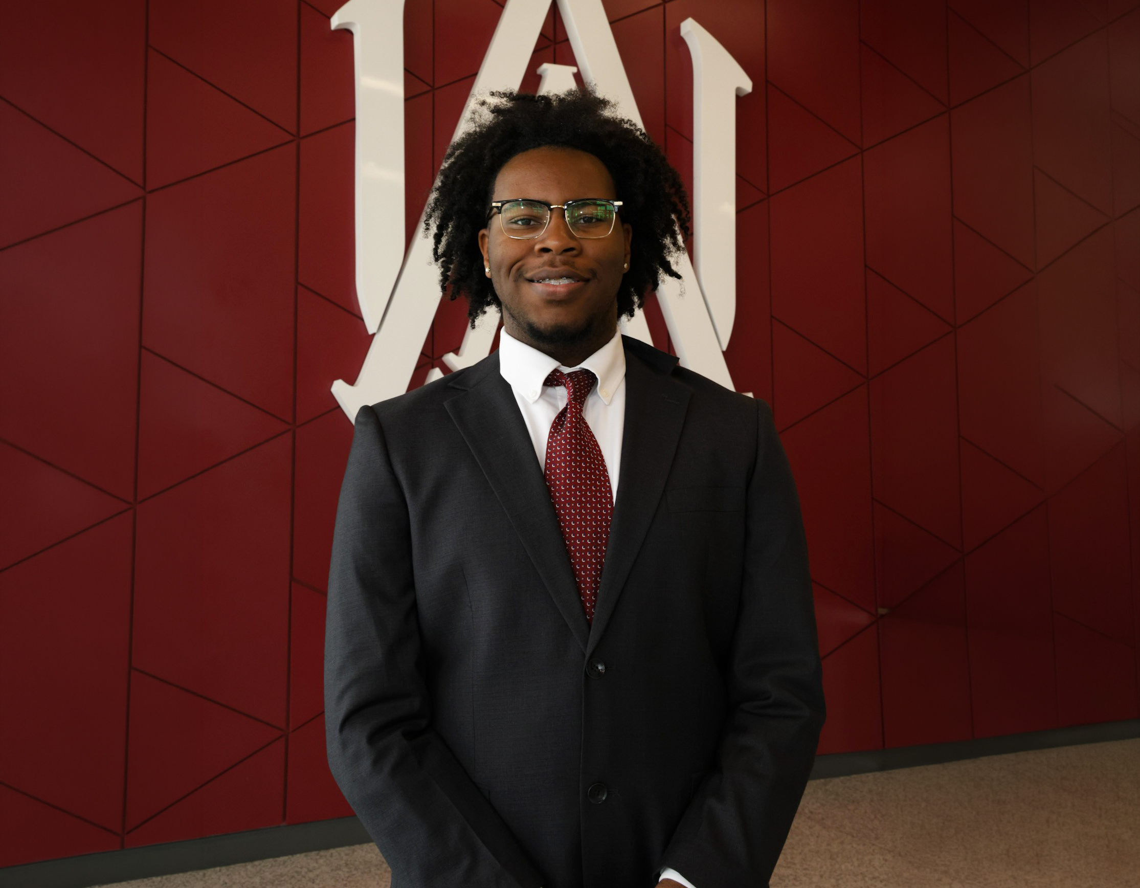 Clark smiles in the lobby of the AAMU Event Center