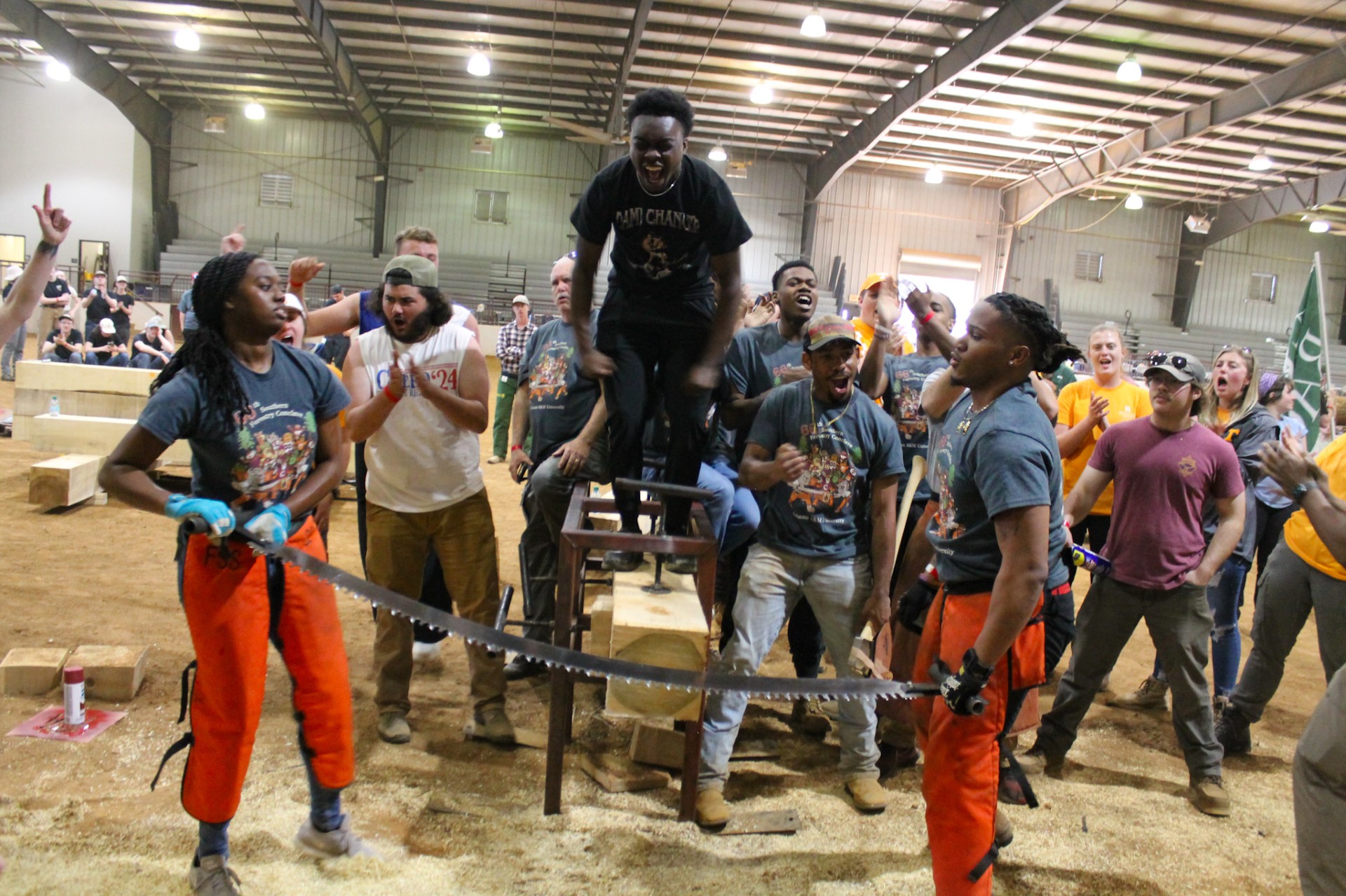AAMU students cheer as two students compete cross-cut event