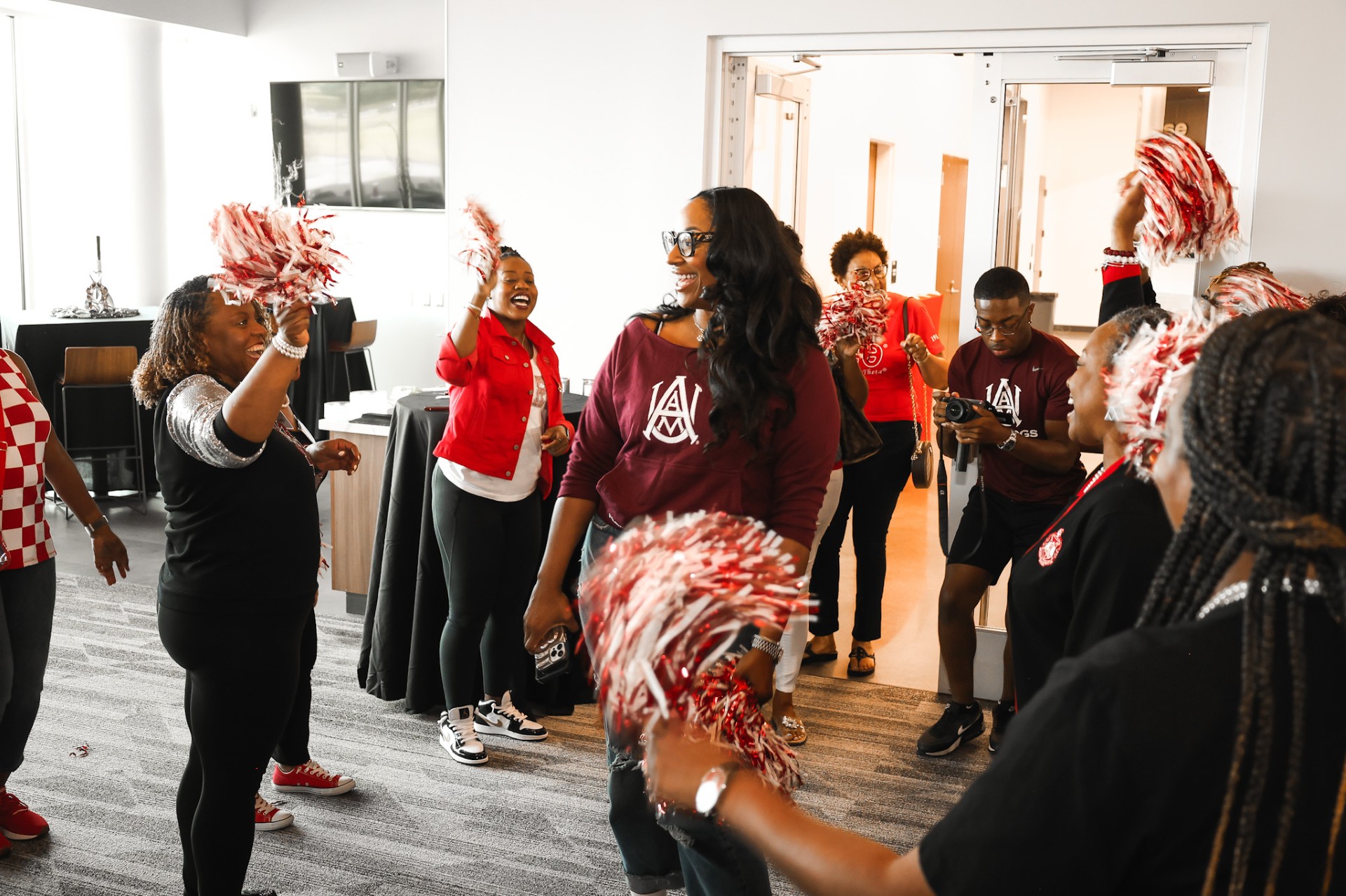 Group photo of AAMU Divas with Coach Dawn Thornton