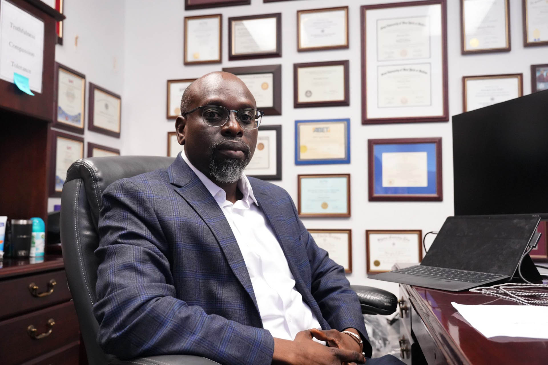 Dr. Mebougna Drabo sits at his desk in his office at Alabama A&M University