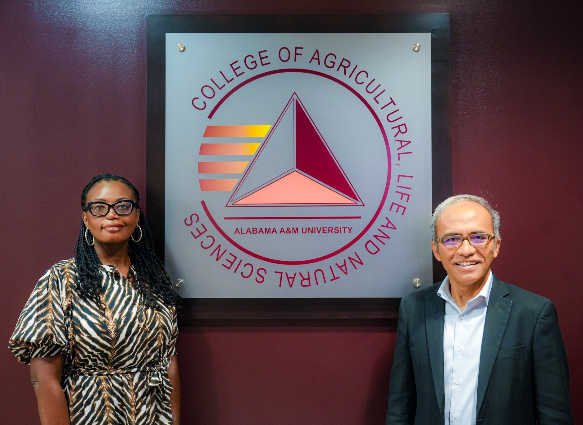 Dr. Elica Moss and Dr. Deden Rukmana