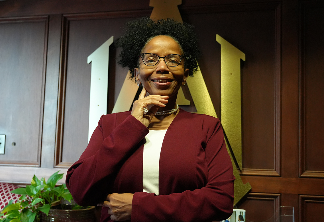 Freddie Gambles stands in the Office of the President of Alabama A&M University