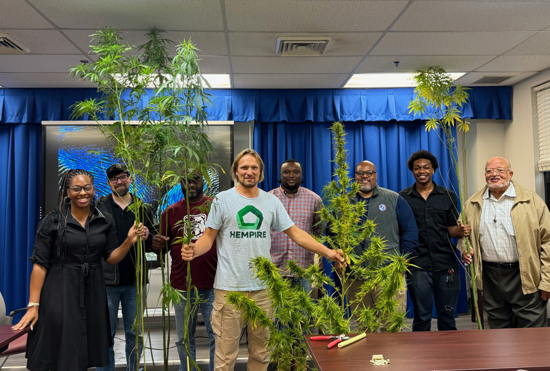 Renowned Hemp Builder Sergiy Kovalenkov stands with seven local builders and contractors during two-day Hemp Building Workshop at AAMU's Dawson Building