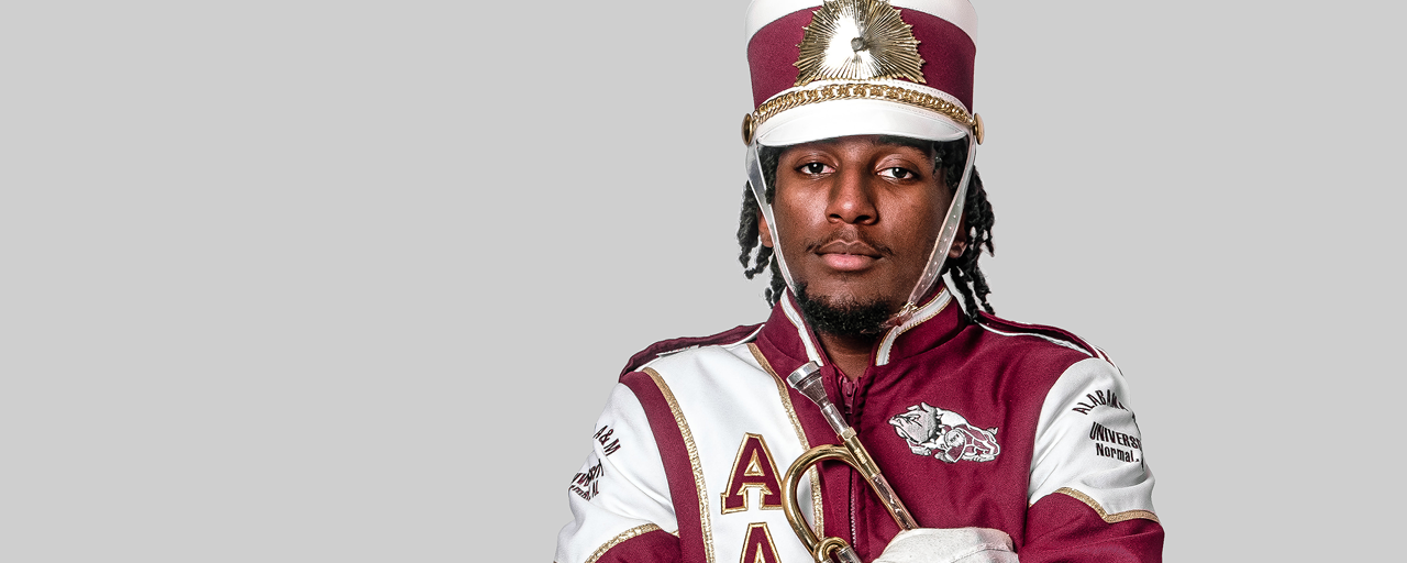 Marching Maroon and White band member