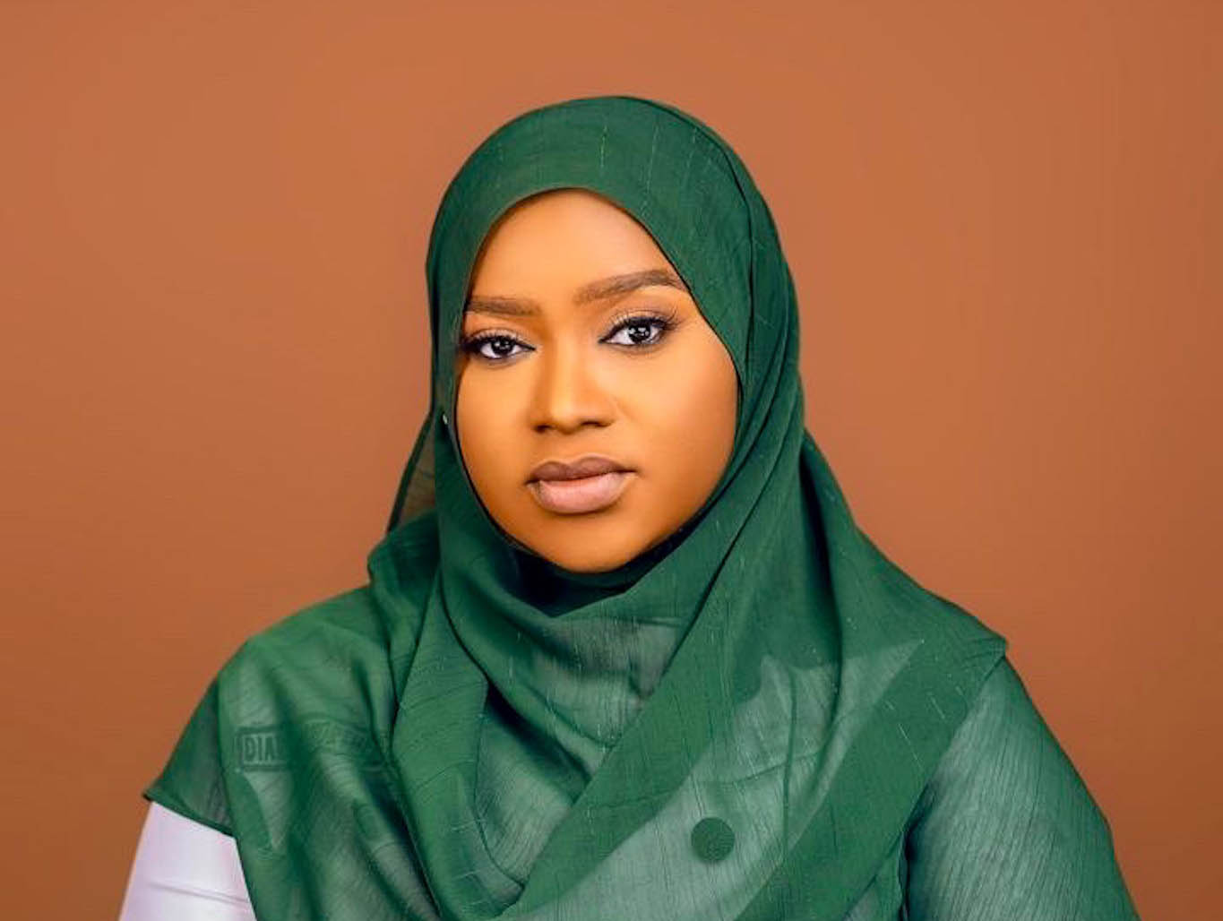 Raja'atu Muhammed wearing a green Khimar