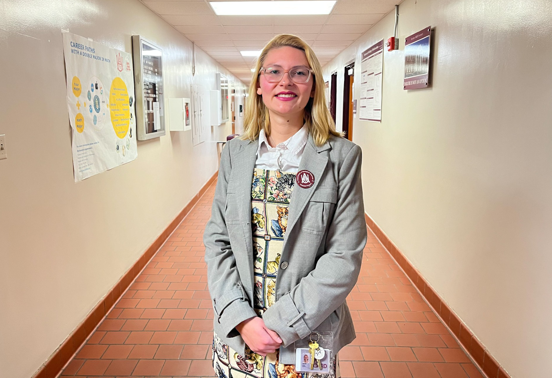 Dr. Dana Indihar smiles as she stands outside of her office in Carter Hall in the AAMU Science Building