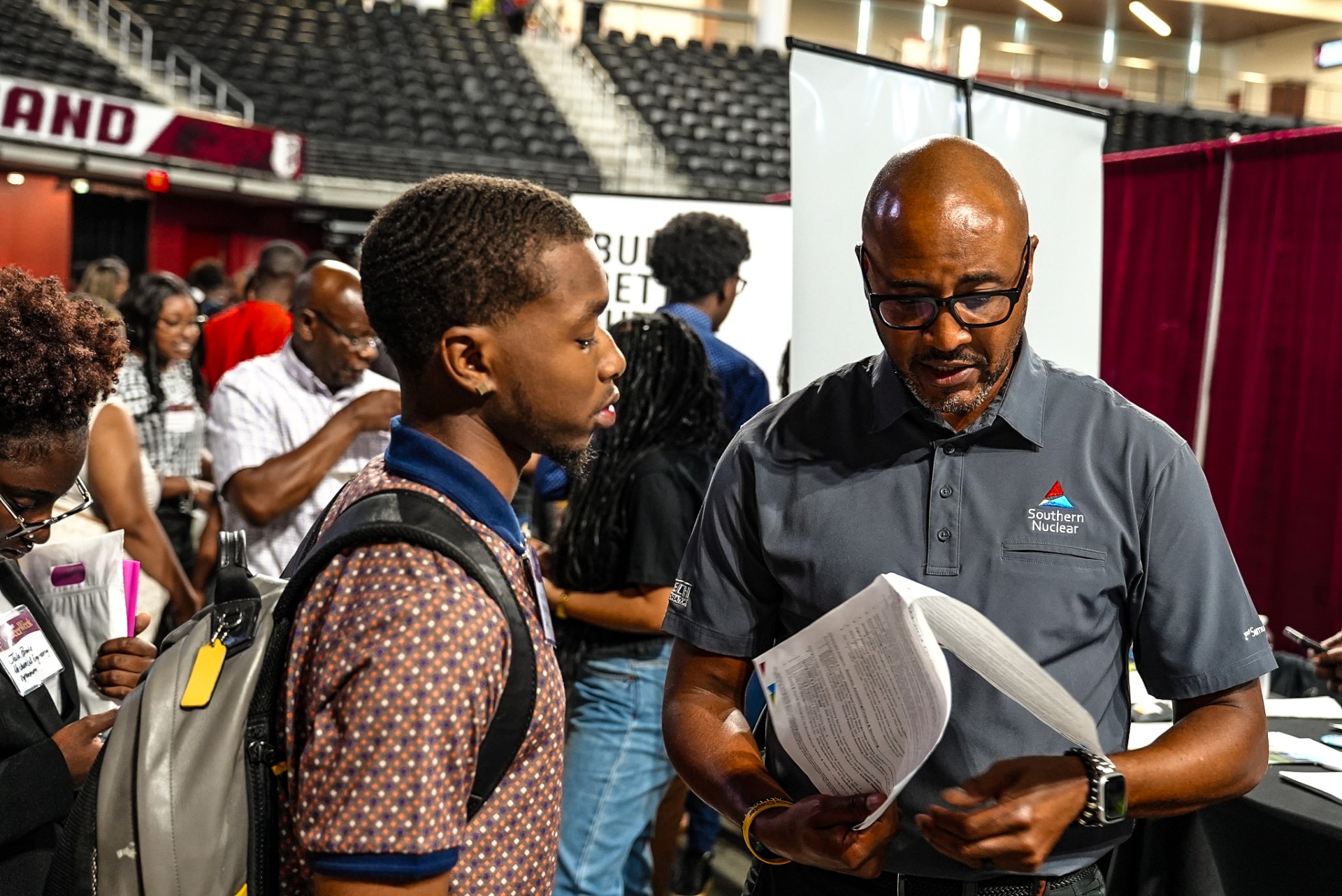 Student Speaking to Recruiter at the Alabama A&M Career Fair in 2023