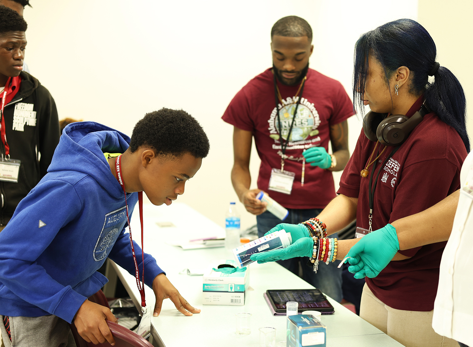 =A student participates in a hands-on demonstration during the 2026 Alabama Jr. MANRRS Leadership Institute at AAMU.