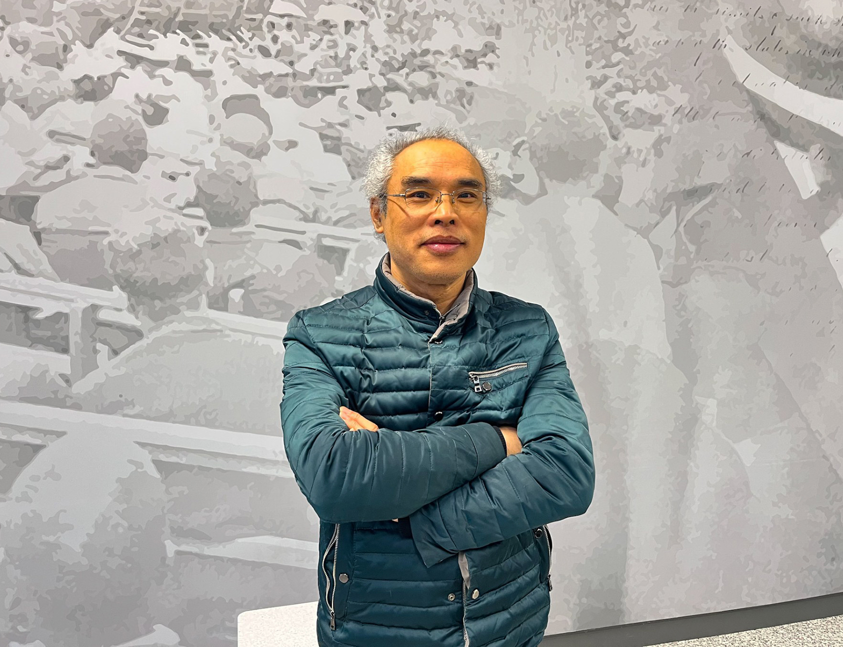 Dr. Congxiao Liu standing in the AAMU Event Center lobby