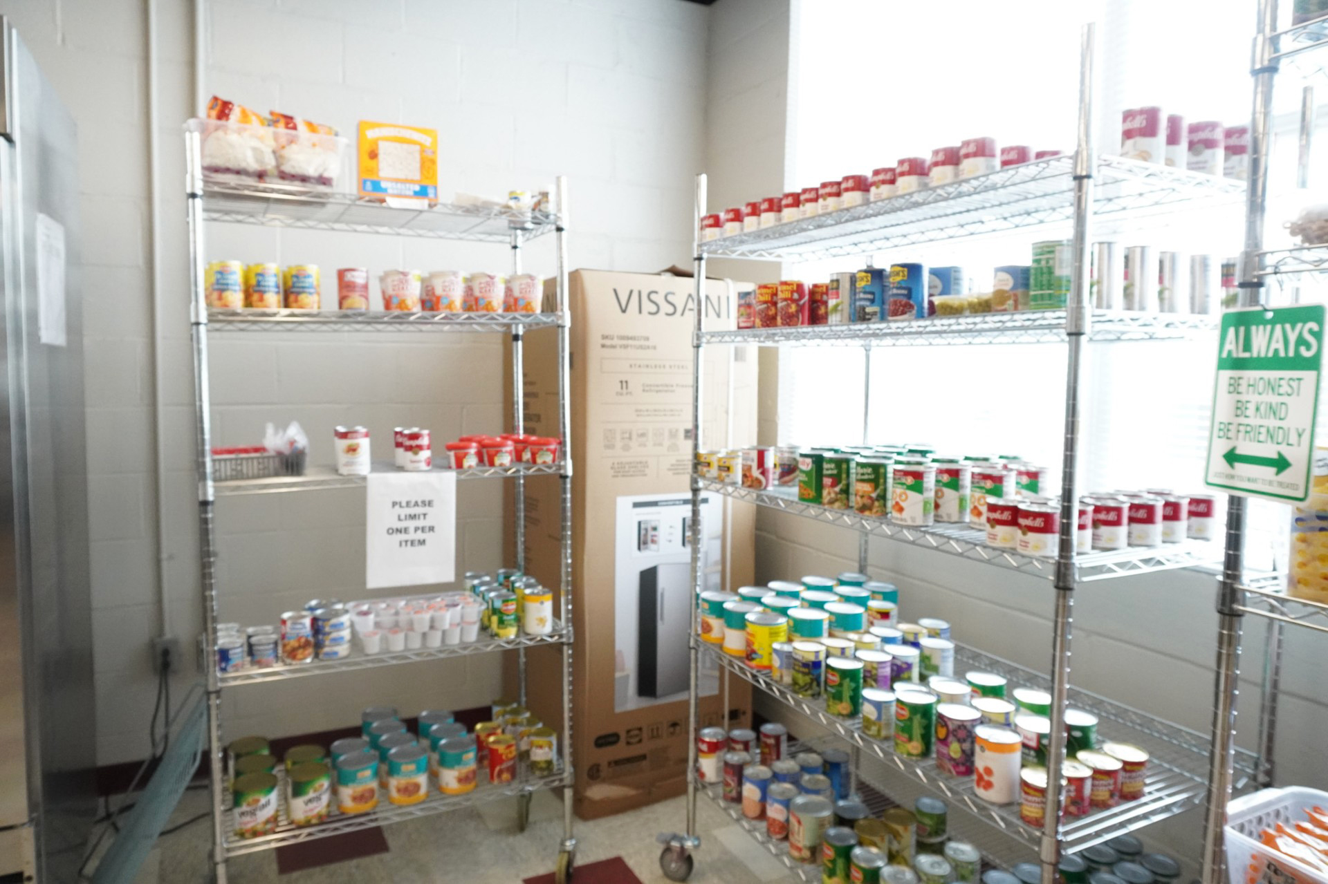Shelves with food and soup cans at AAMU Bulldog Market