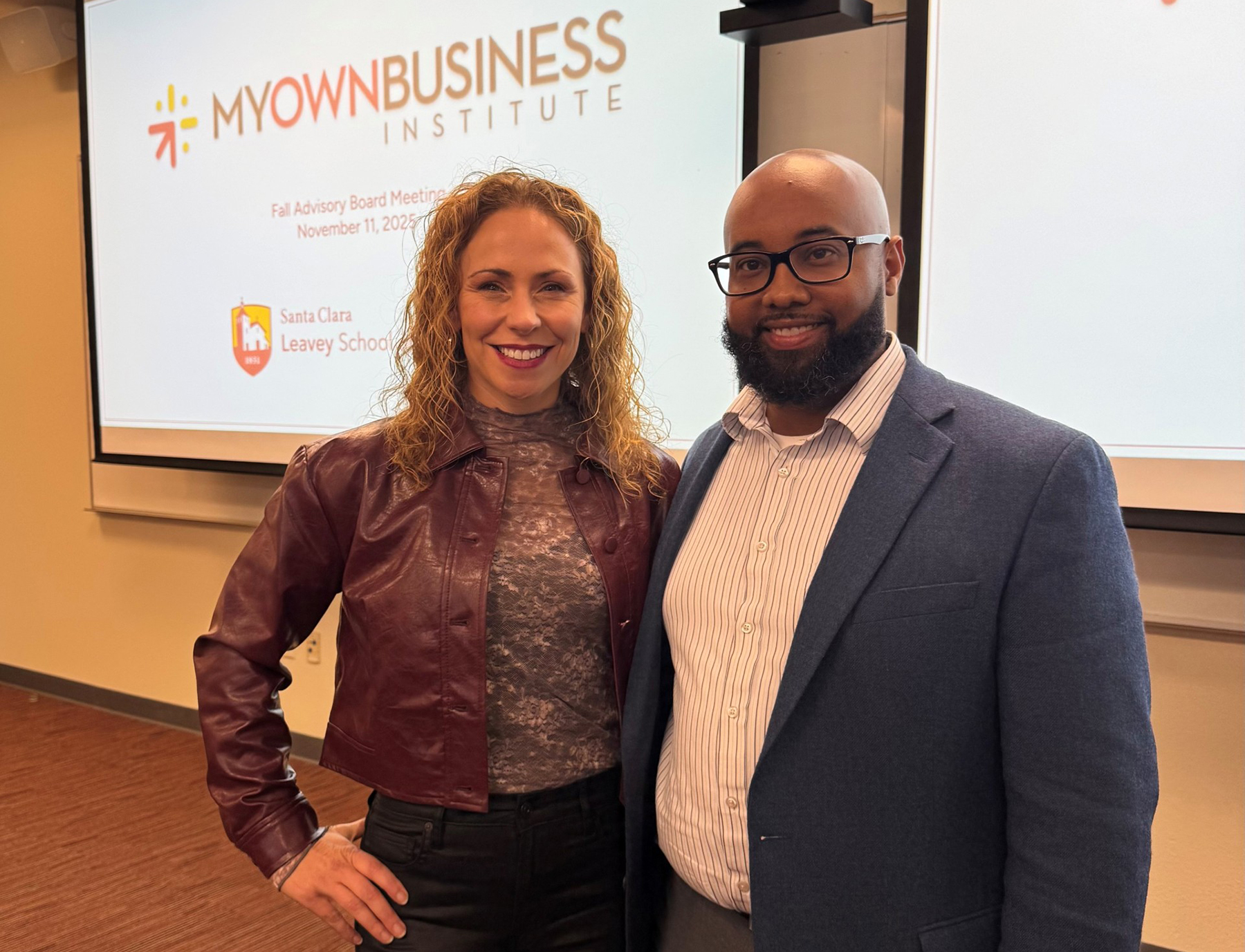 Trish Kalbas-Schmidt and Terence Norwood standing together for a photo