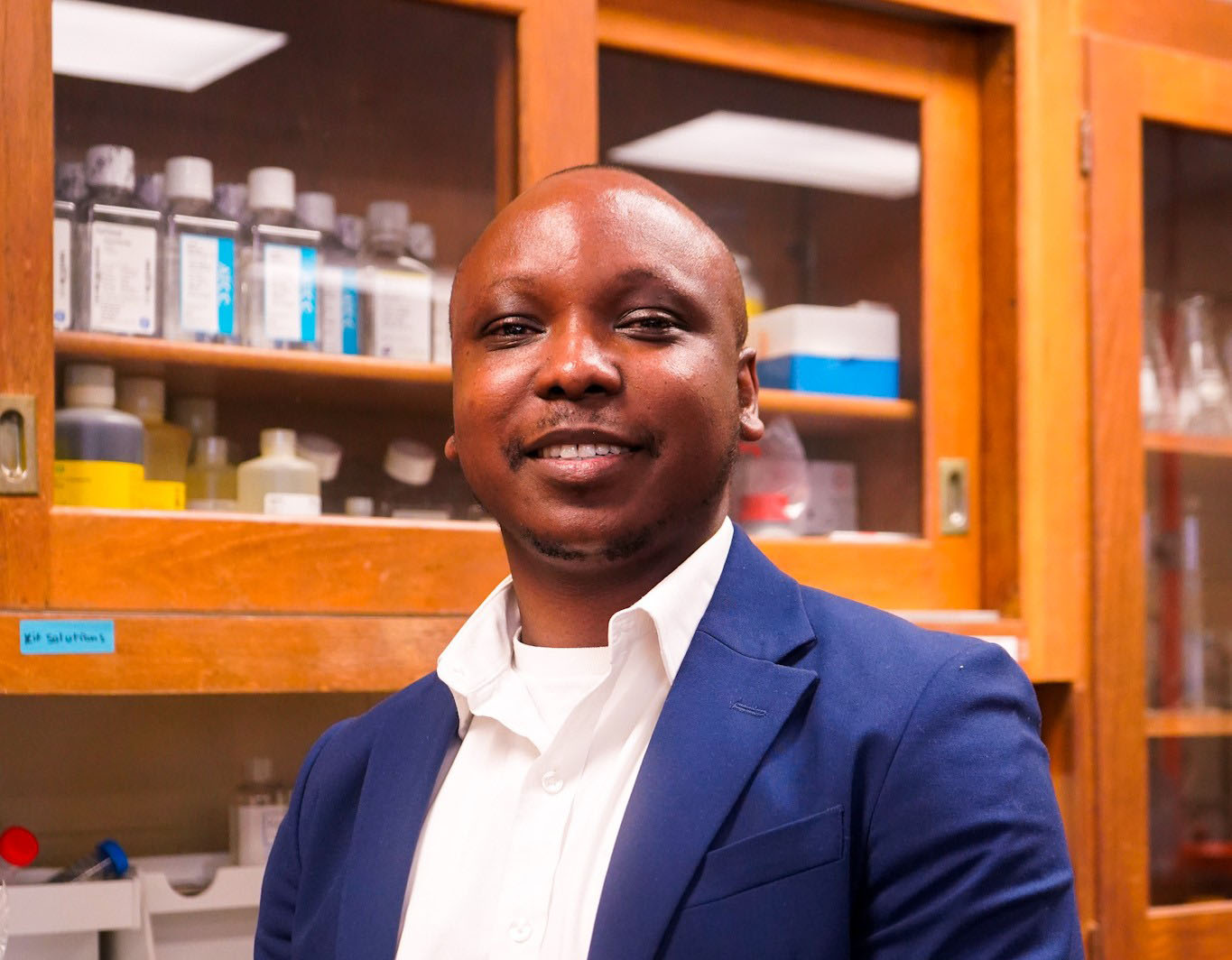 Ph.D. Candidate Nathaniel Ogunkunle smiles in his lab in Carver Complex South at AAMU