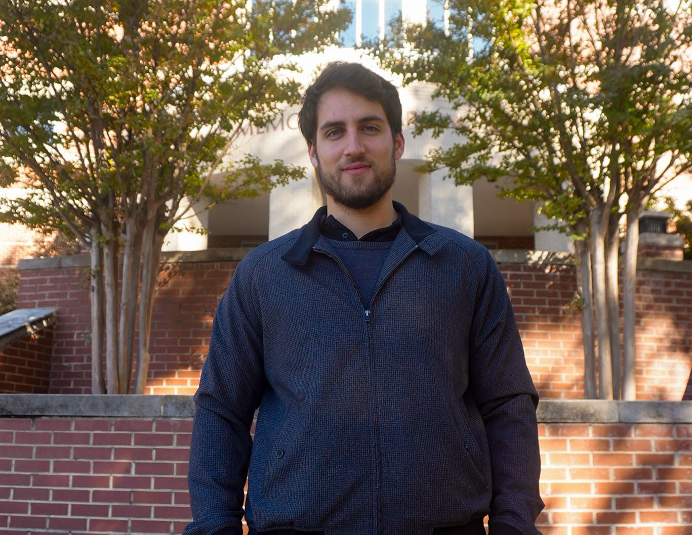 Pablo Ruiz Crespo standing in front of the AAMU library