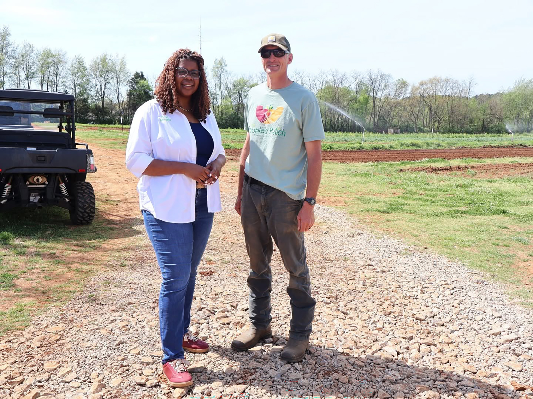  Madison County District 6 Commissioner Violet Edwards and Harvest Manager Jason Andra at The People’s Patch. 