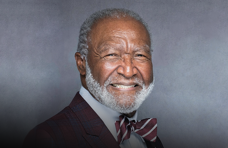 Robert Holmes Jr. smiles at camera