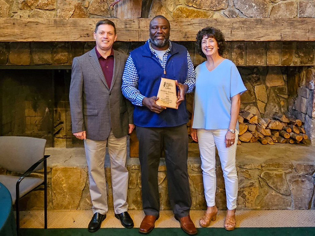 AAMU Urban Regional Extension Agent Roosevelt Robinson (center) Receives Alabama Project Learning Tree Educator of the Year Award