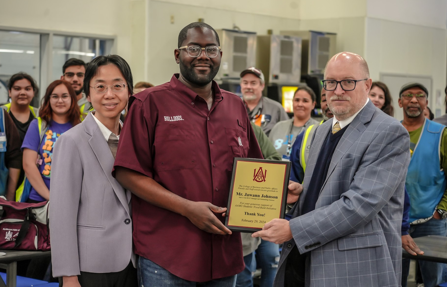 Dr. Qian Rub Shen, AAMU Alumnus Jawann Johnson, Dr. Tim Mantz and Workers