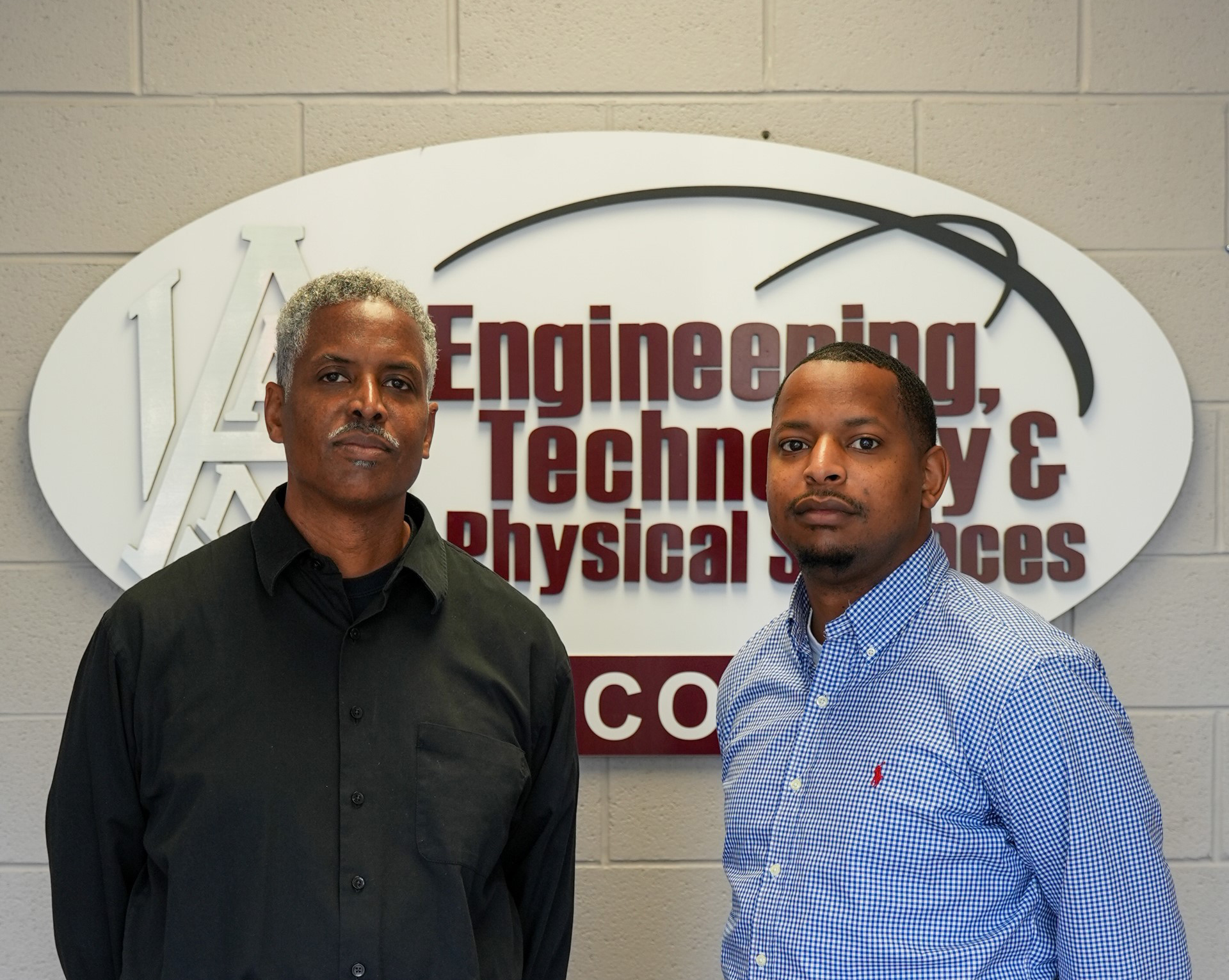 AAMU Professor Dr. Kenneth Sartor and senior Malcolm Echols