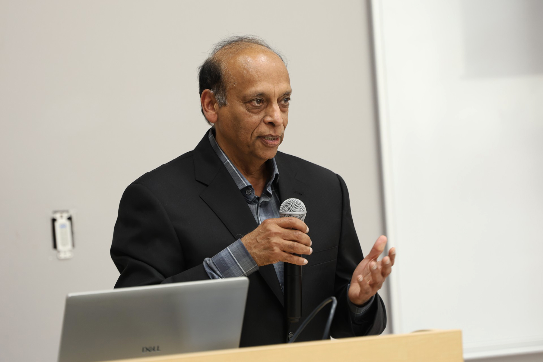 Dr. Anup Sharma addresses colleagues and students during a retirement celebration honoring his 34 years of service to Alabama A&M University.
