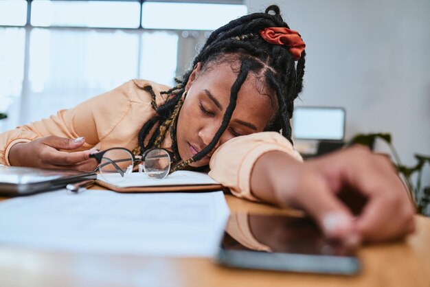 Student taking a nap at computer