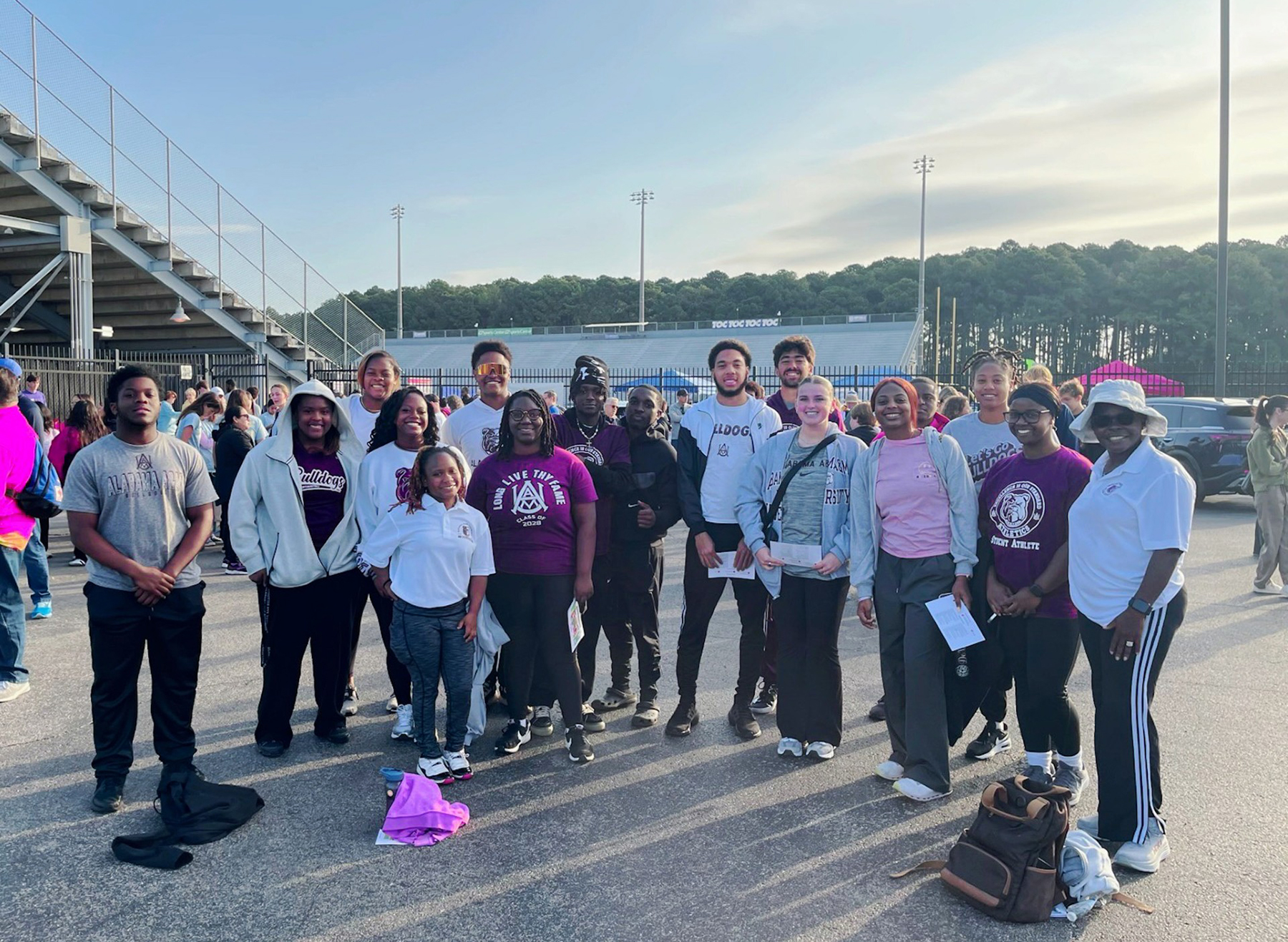 AAMU Kinesiology students stand as a group before assisting athletes at Milton Frank Stadium in Huntsville, Alabama