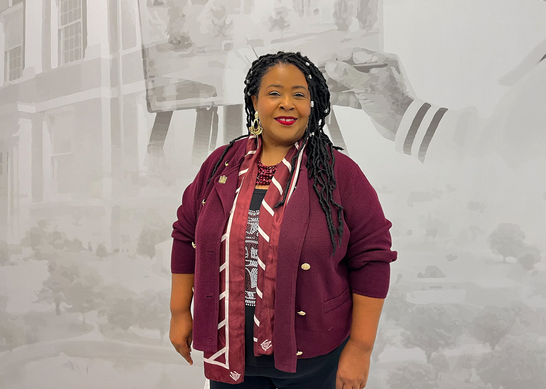 Dr. Charlotte Teague smiling in the AAMU Event Center lobby