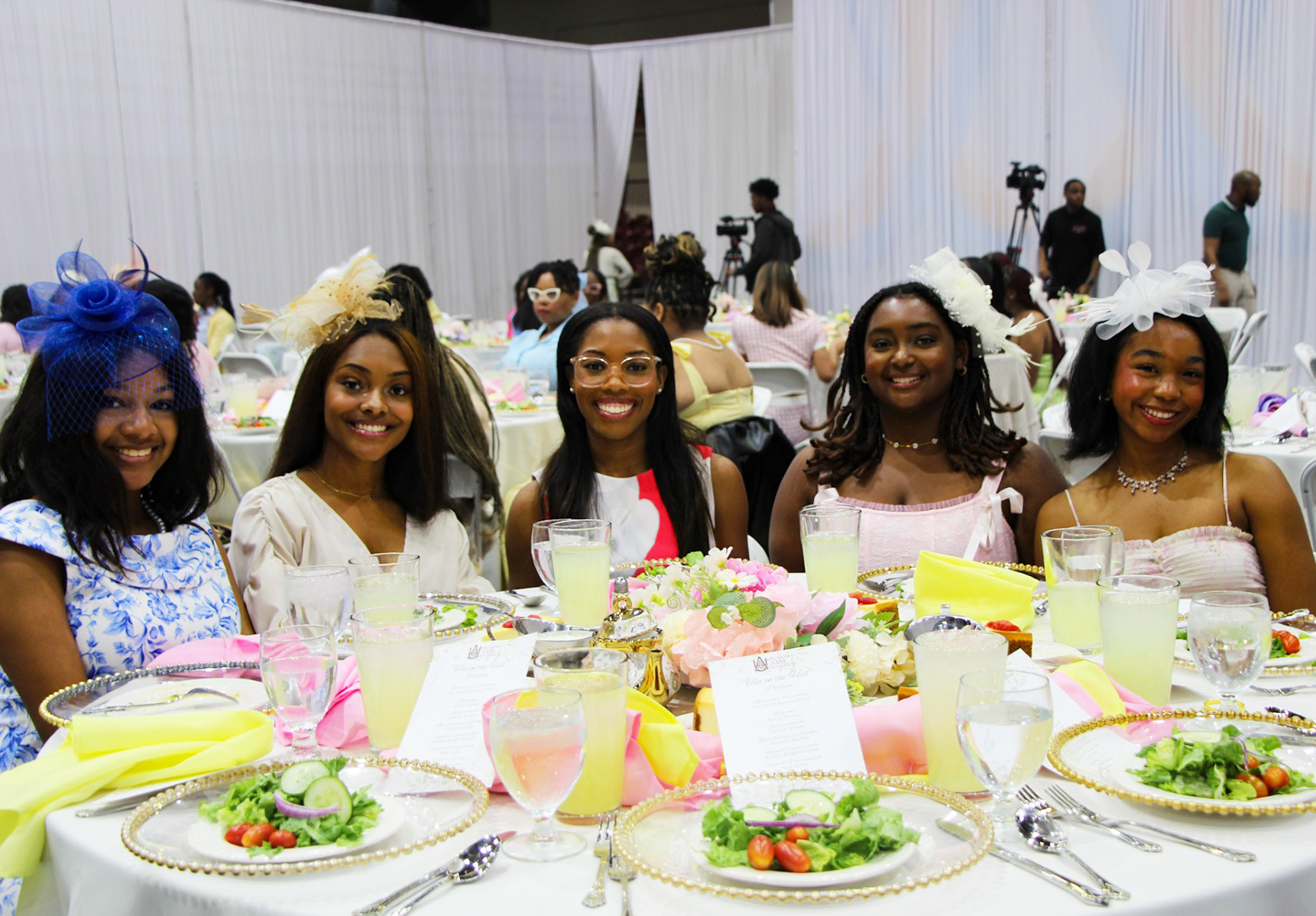 Five AAMU students smile and fashionably dressed for 2025 Tea on the Hill