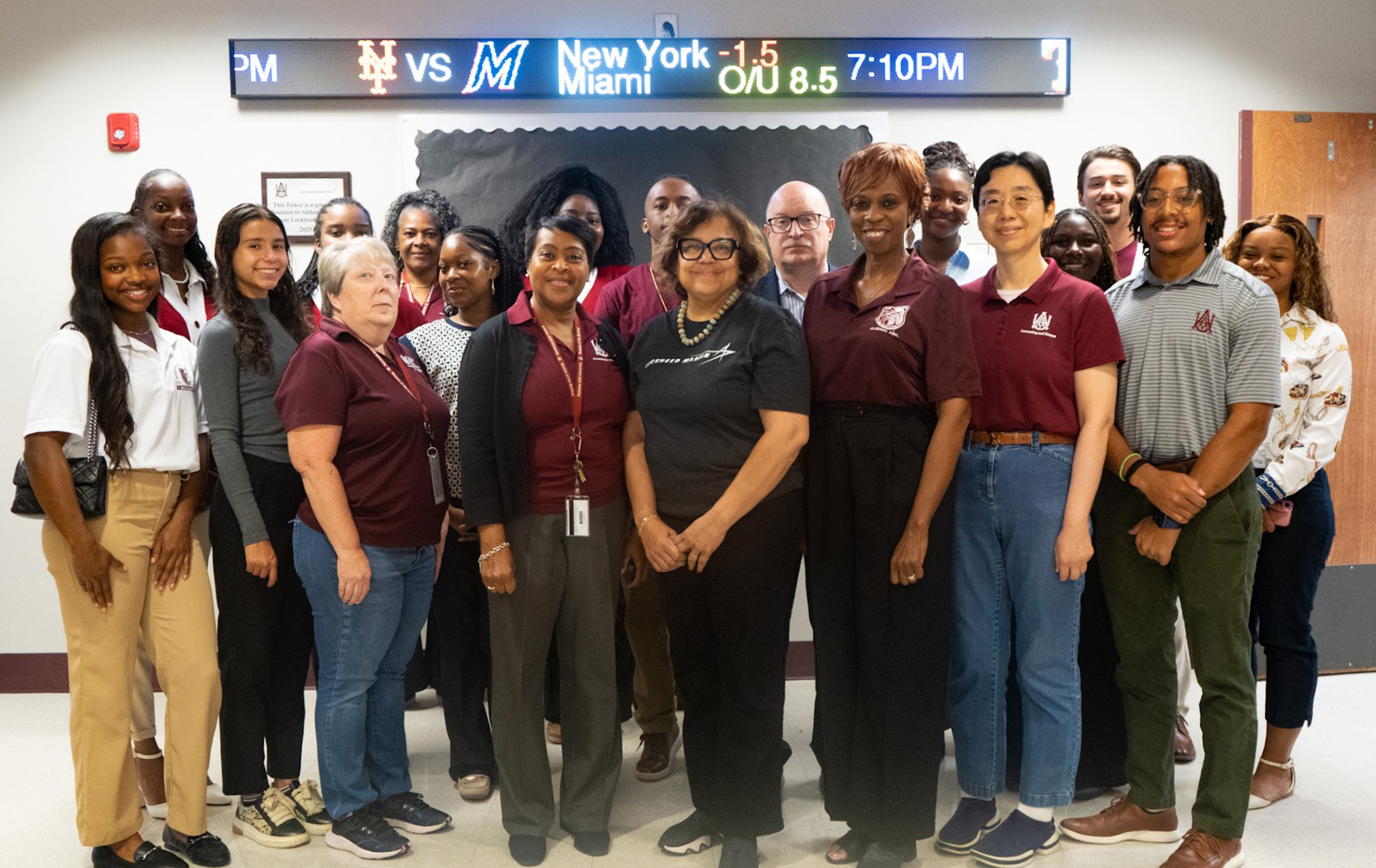 AAMU students, faculty and staff gather after ribbon cutting for new stock ticker sponsored by Lockheed Martin