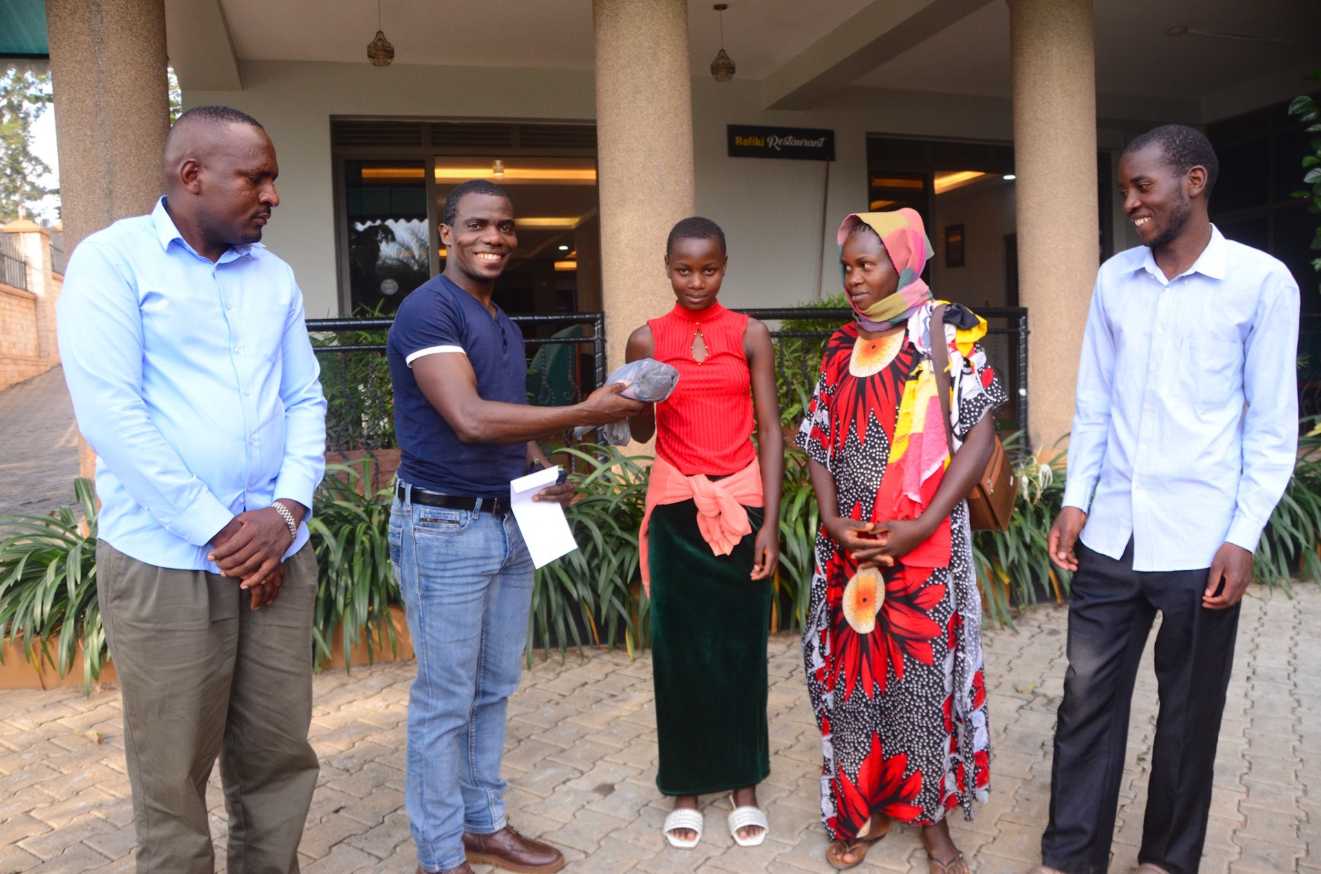 Dr. Twijukye meets Student Athlete Annitah Akankwatsa and her family