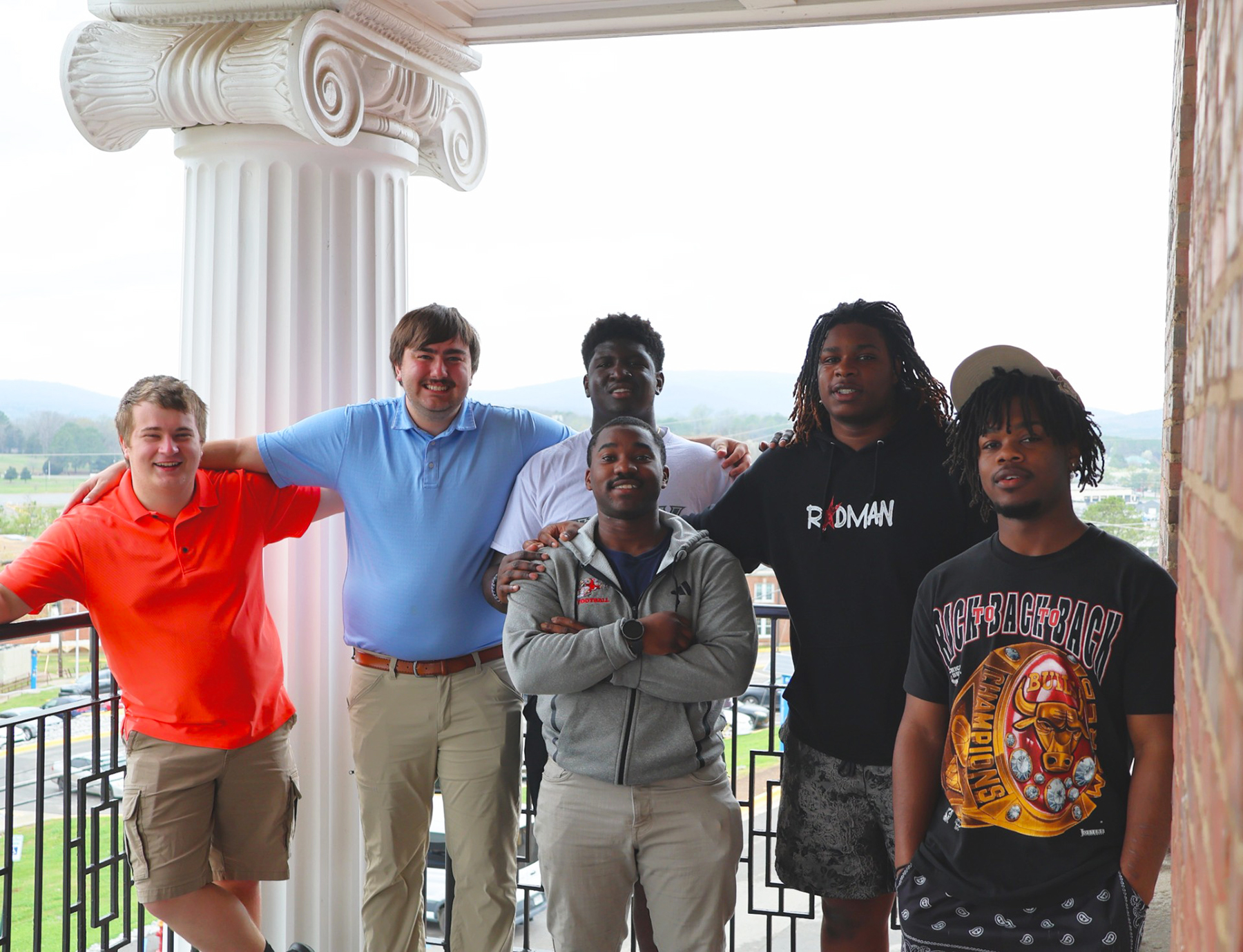 Wabash College Students post for a group photo on the third floor balcony of the State Black Archives Research Center and Museum on the AAMU campus.