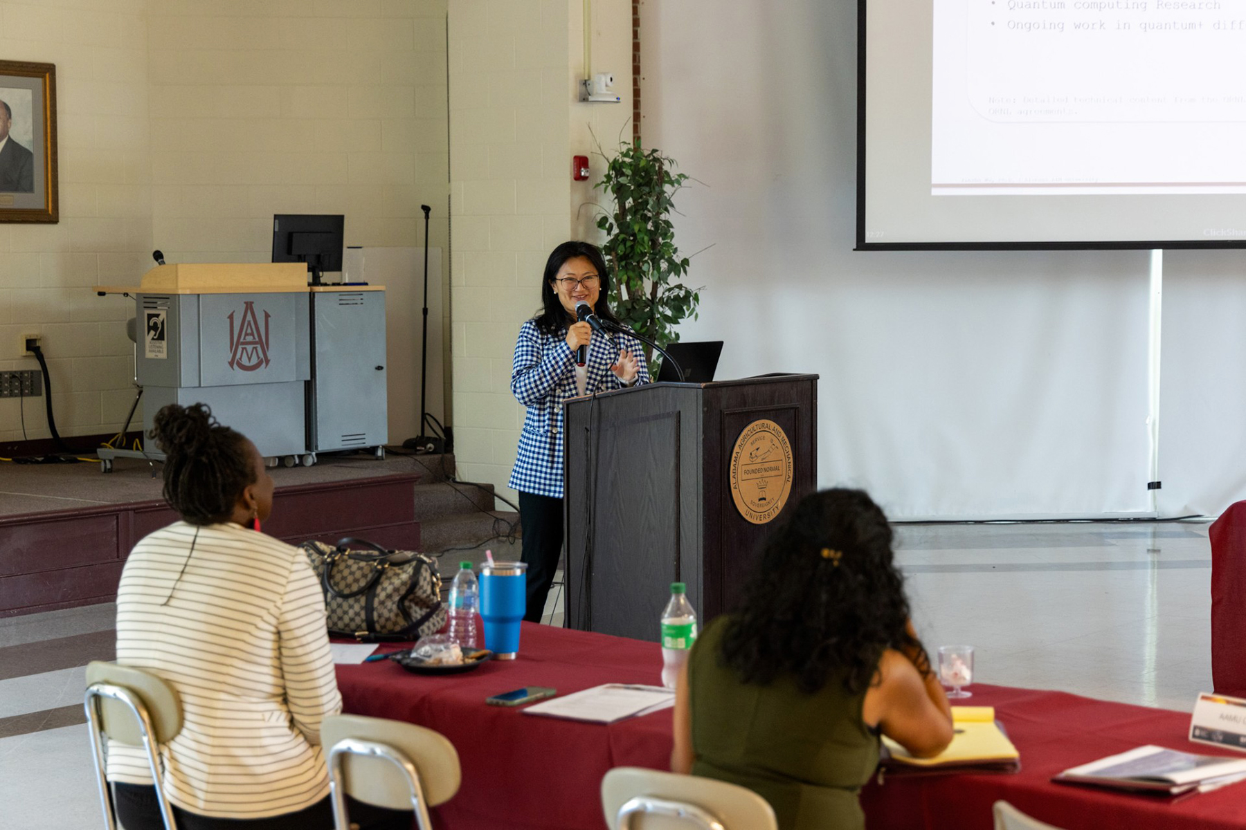 Dr. Yinshu Wu presents her research to U.S. Space Command officials.