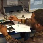 A student works with a computer