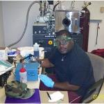 A student works with high-tech lab equipment