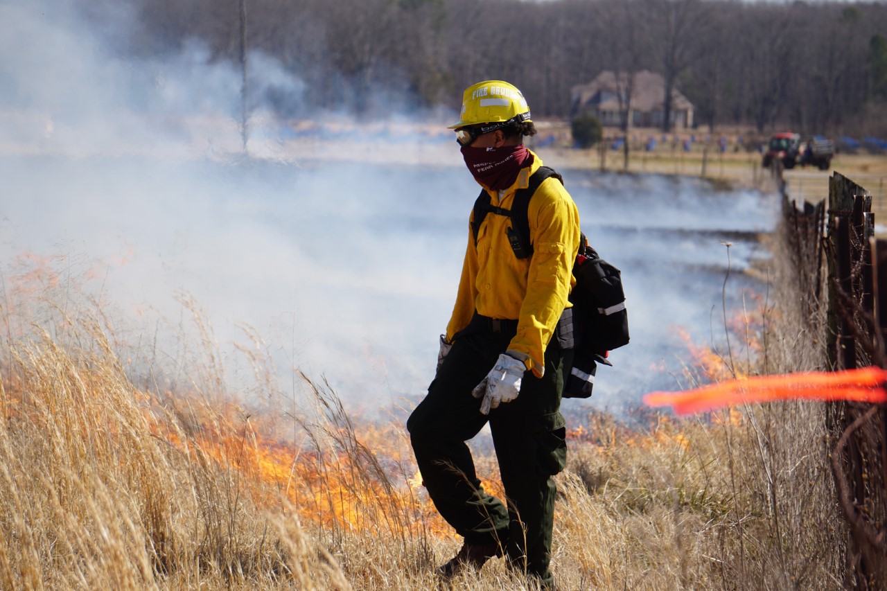 AAMU Forestry Student putting out fire