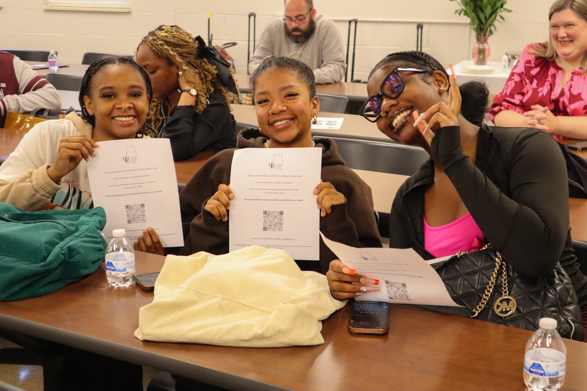 Three Psychology Students Hold Certificates for Free APA Membership 