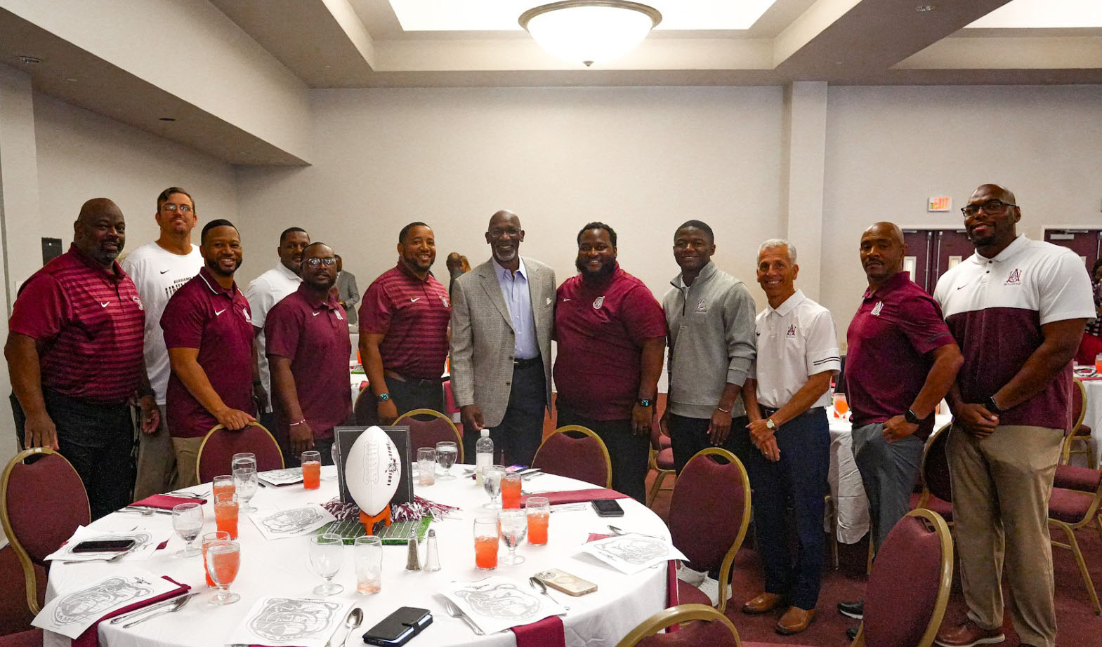 Alumnus and NFL Hall of Famer John Stallworth Stands with Former Players and Coachs 