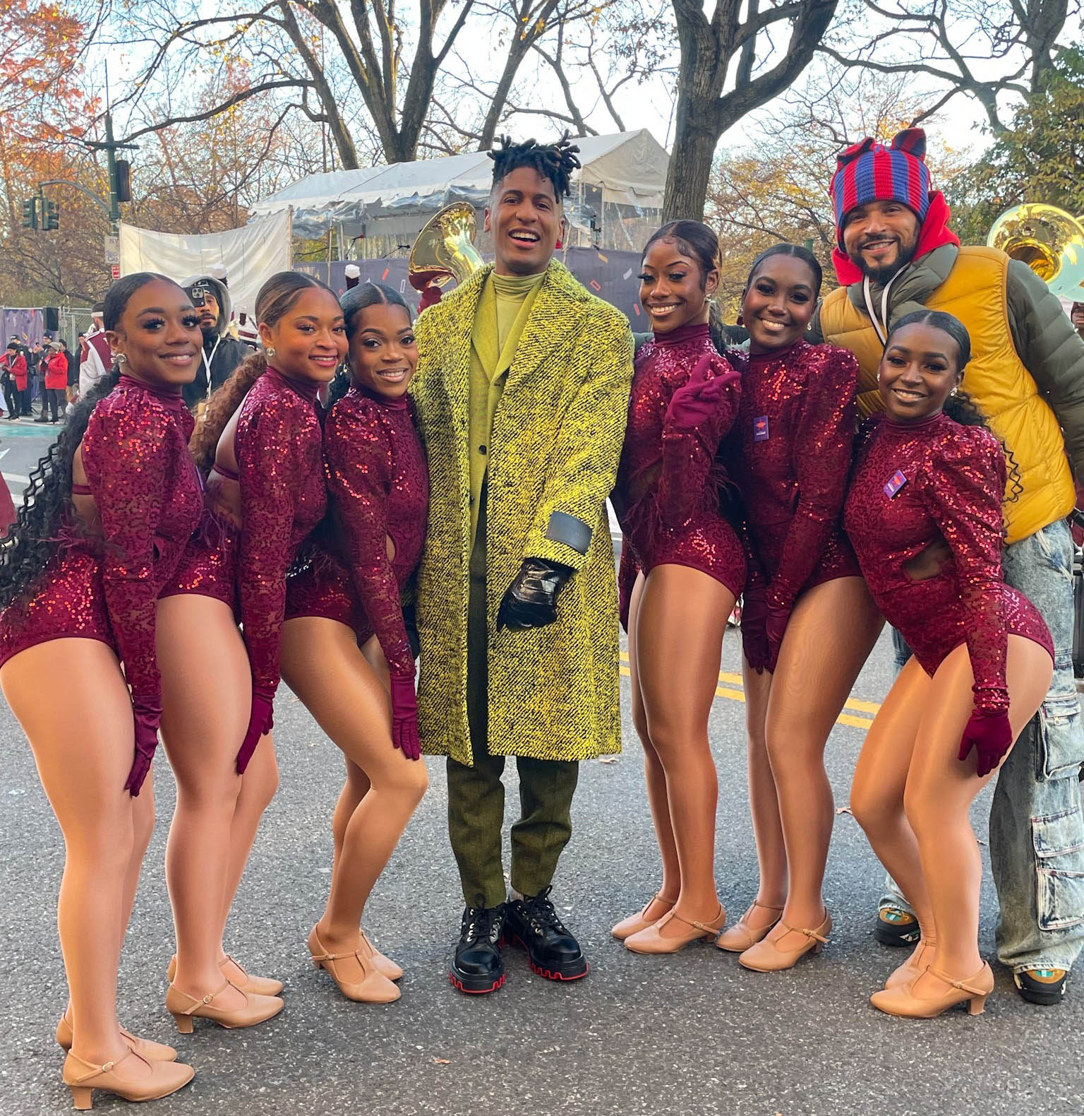 Divas pose with Grammy Award-winner Jon Baptiste at Macy's Thanksgiving Day Parade