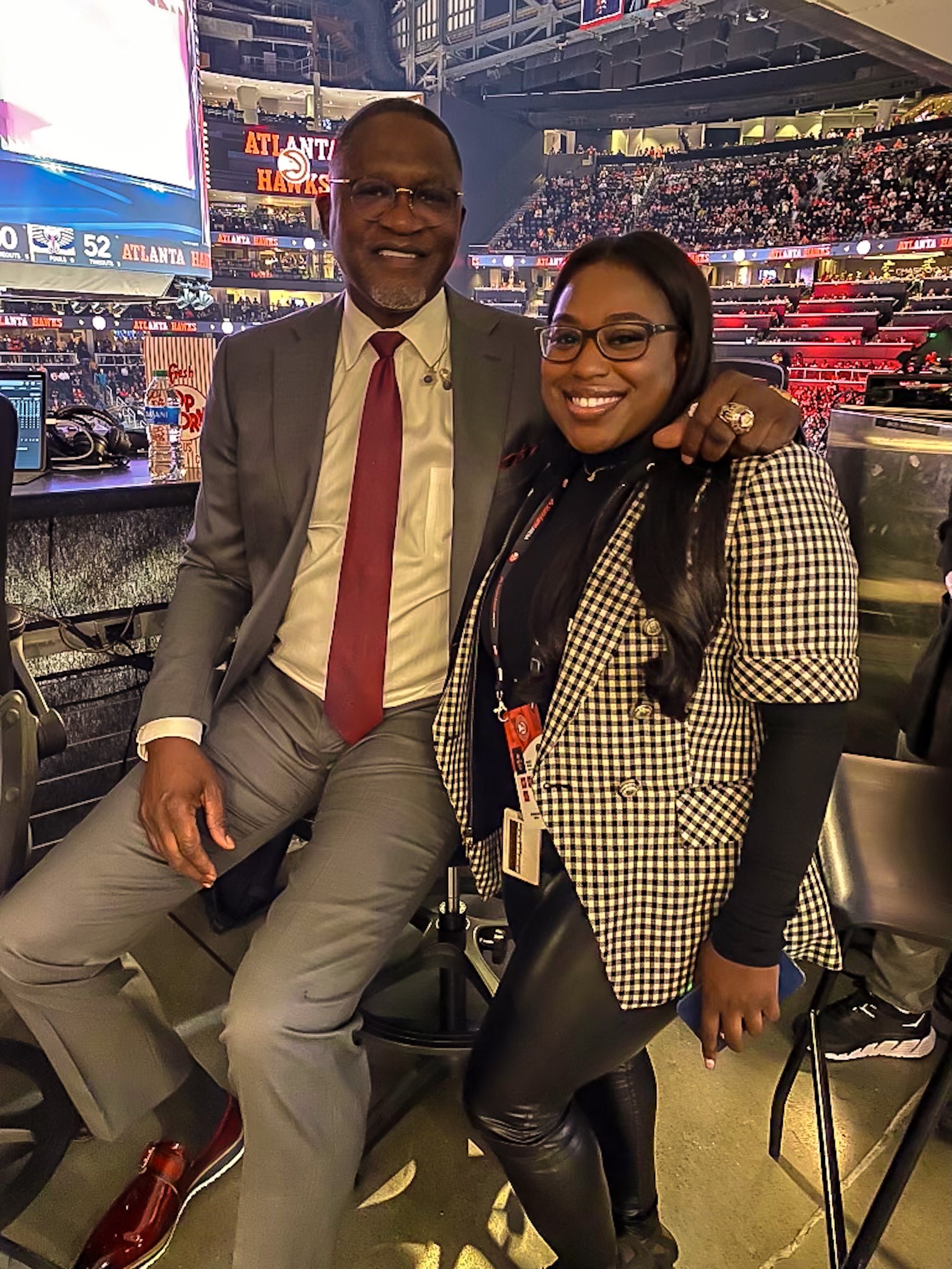 Former Hawks player and current Vice President of Atlanta Hawks Basketball Operations Dominique Wilkins and alumna Missy Dotson